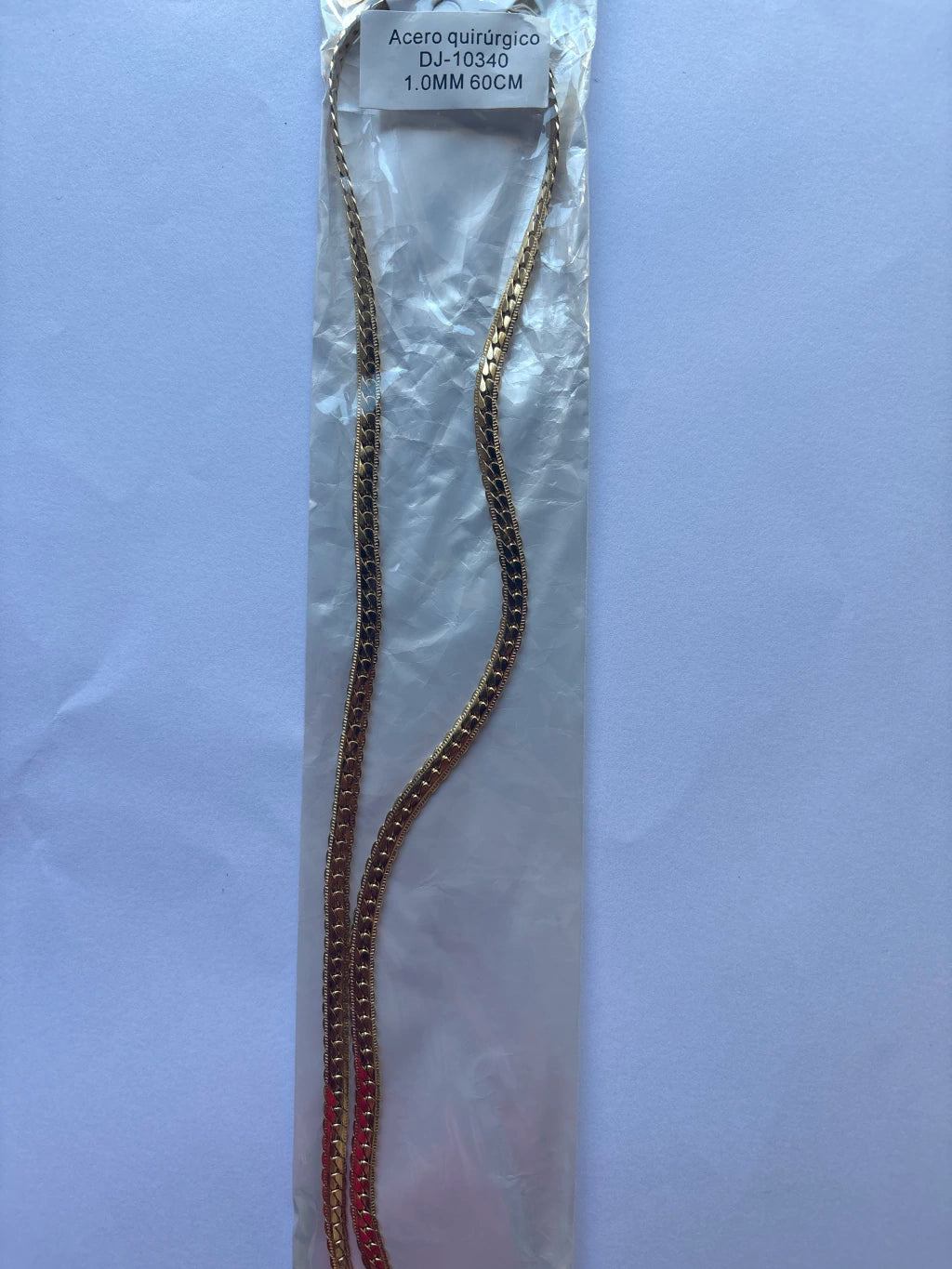 #10340 cadena acero dorado.