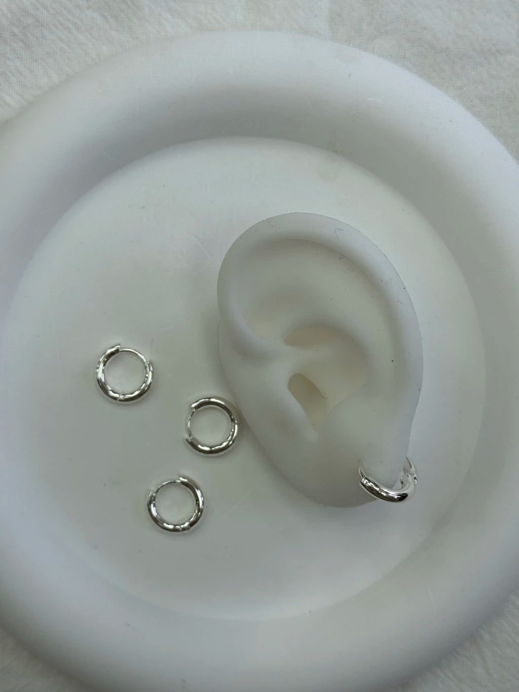 620C argollitas acero blanco x12