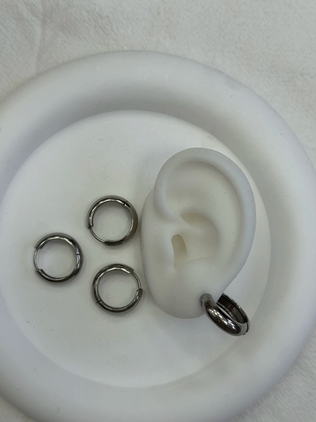 416A4 argollitas acero x12 -