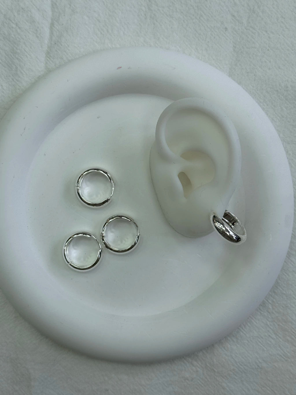 416C argollitas acero blanco x12