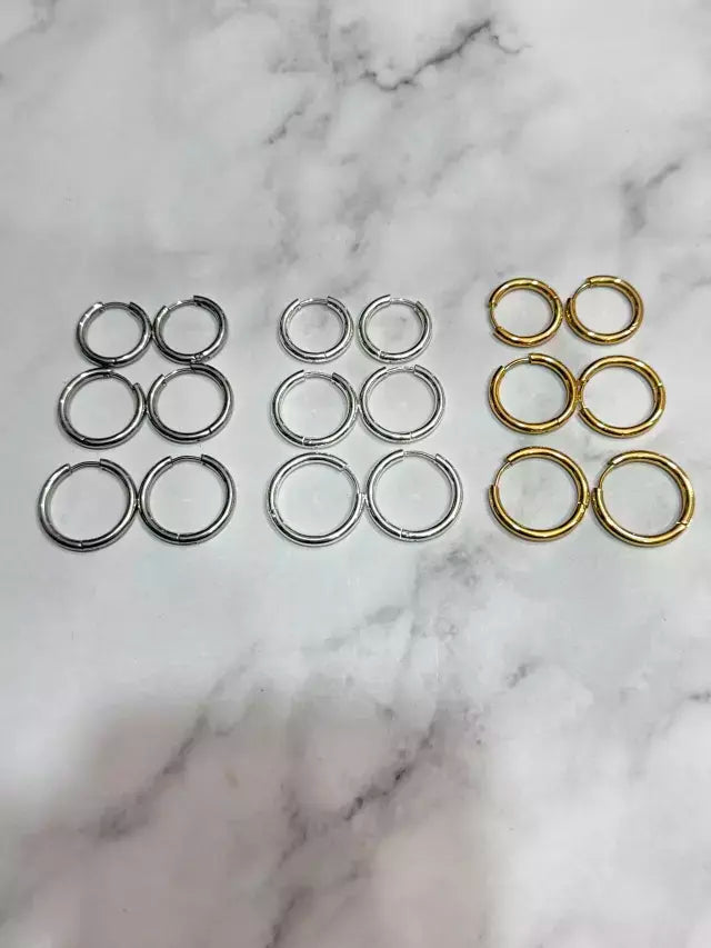 105B Aros de acero dorado tamaño surtido mediano X12