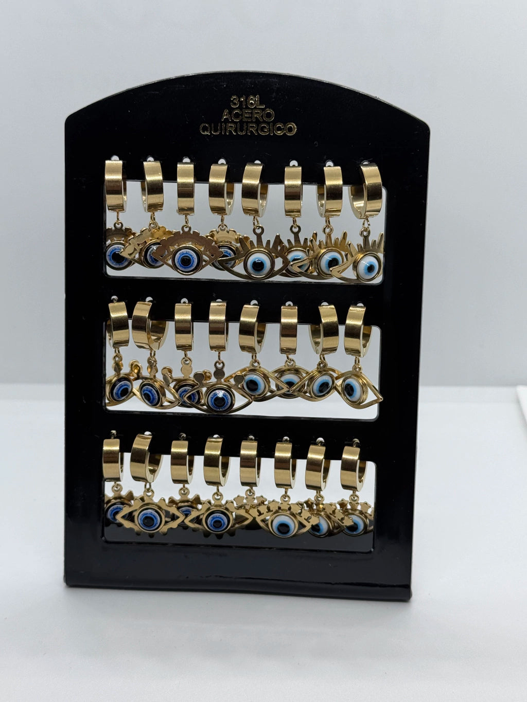 -107B aro cubana con colgante de ojos x12 acero dorado