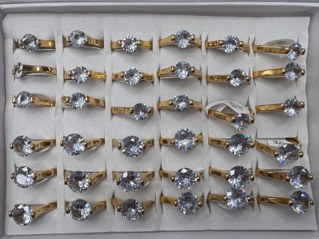 702B. anillos acero dorado