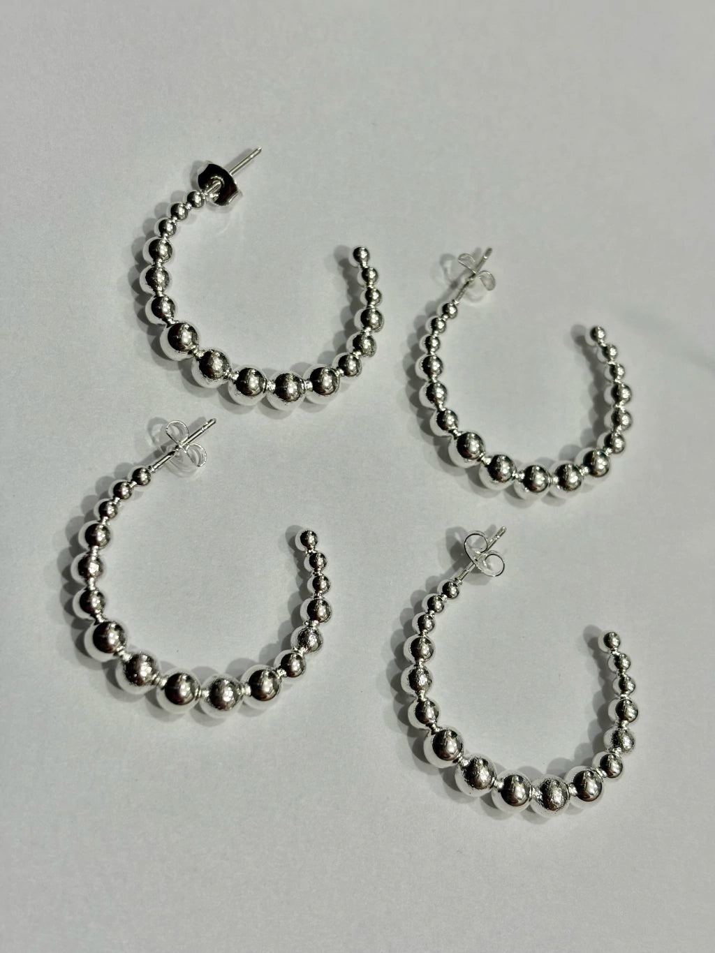 -558C argollas acero blanco x12