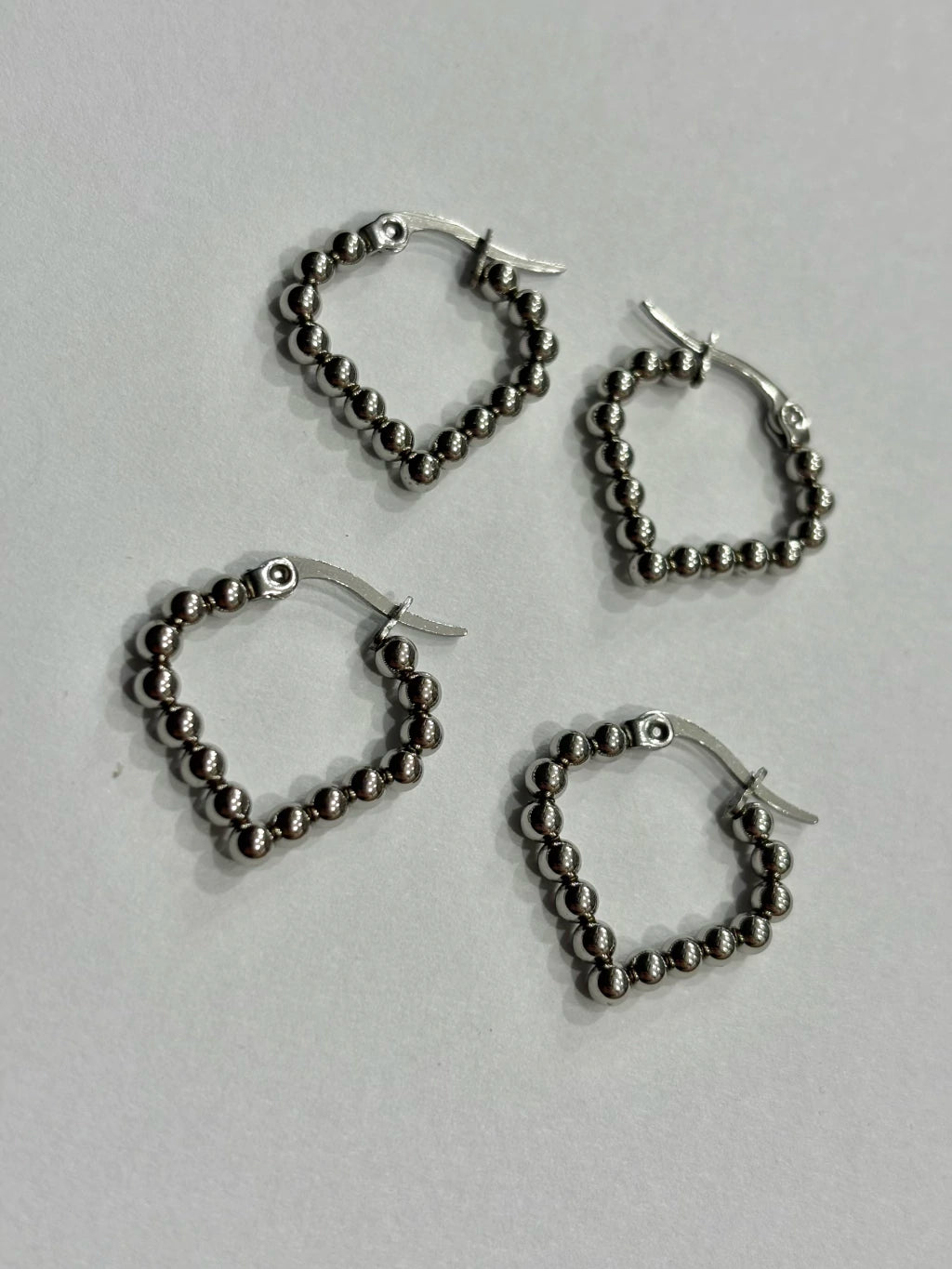 -559A argollas acero plateado x12