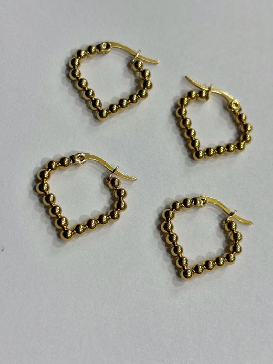 -559B argollas acero dorado x12
