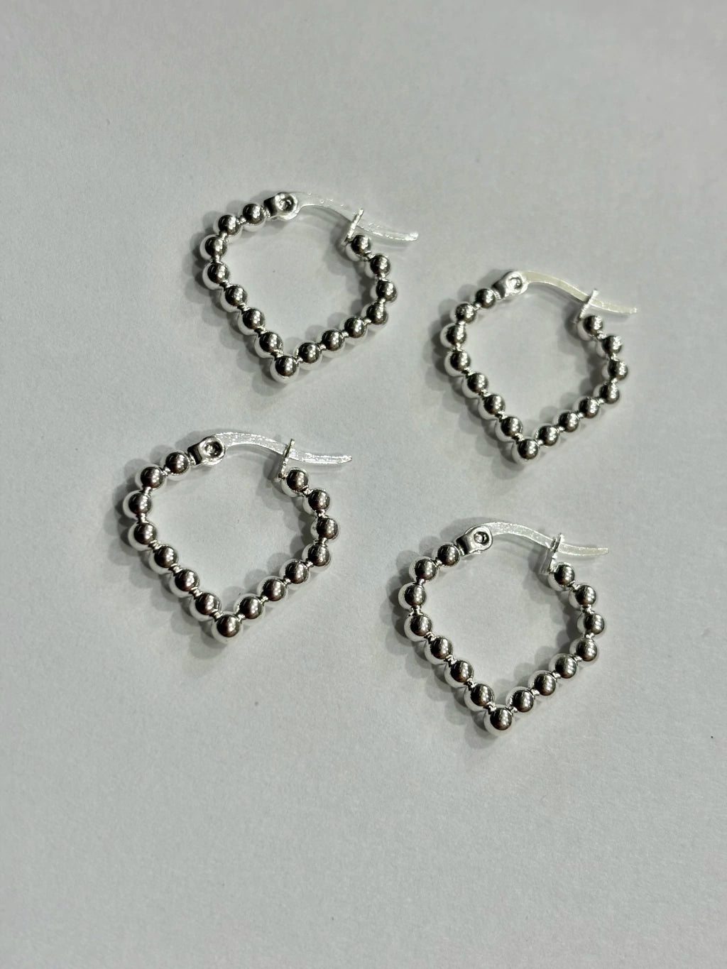 -559C argollas acero blanco x12