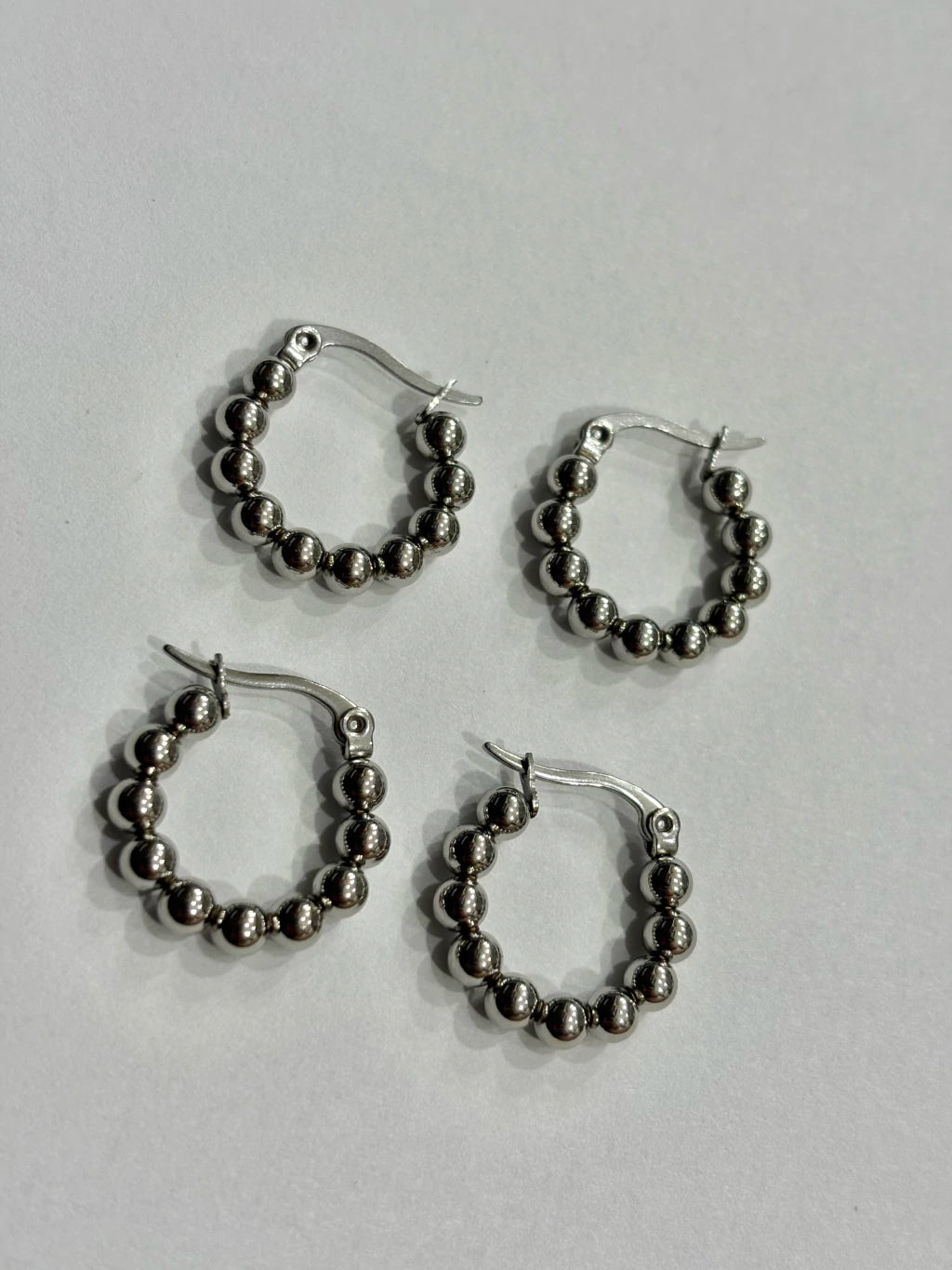 -556A argollas acero plateado x12