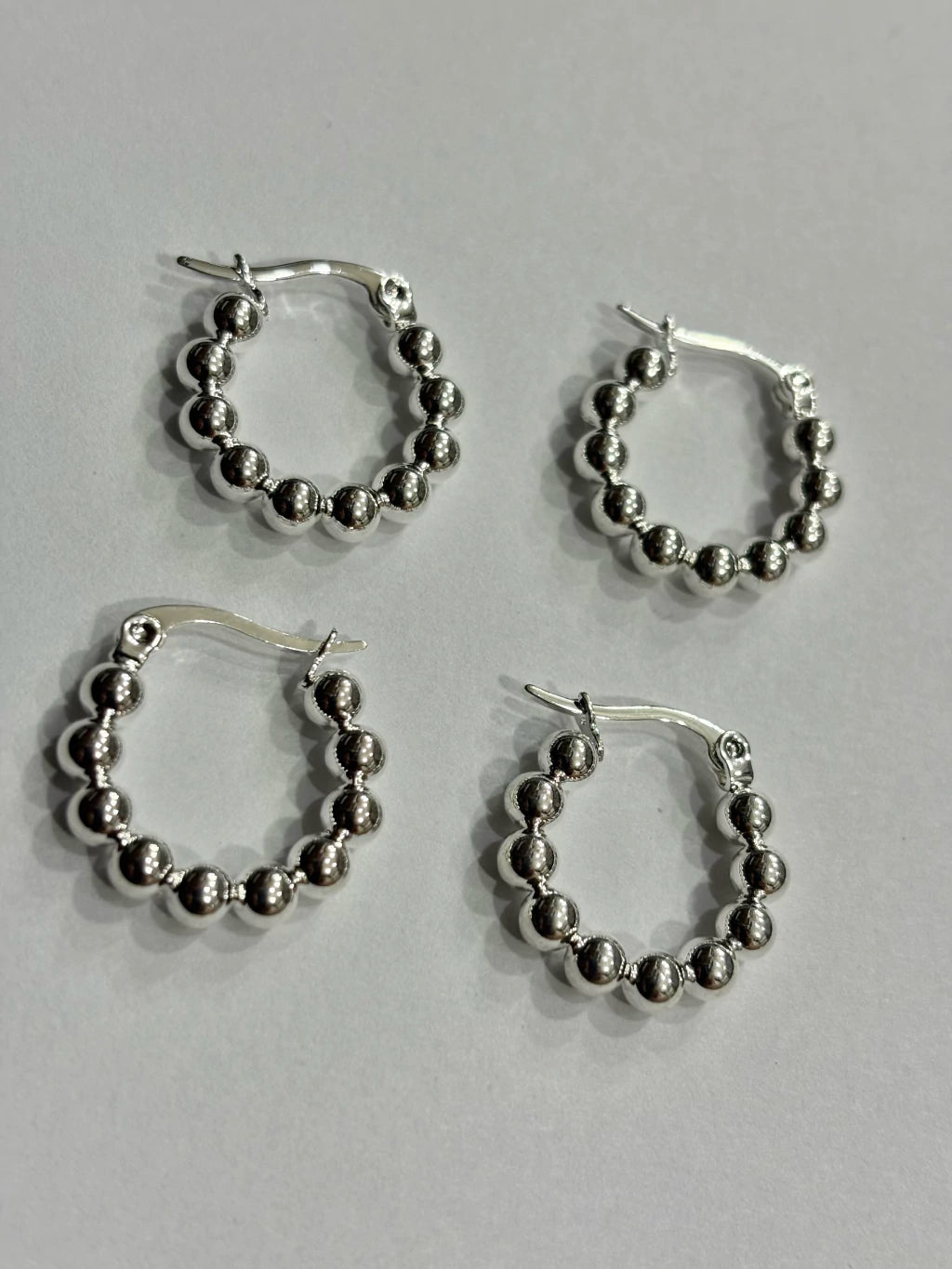 -556C argollas acero blanco x12