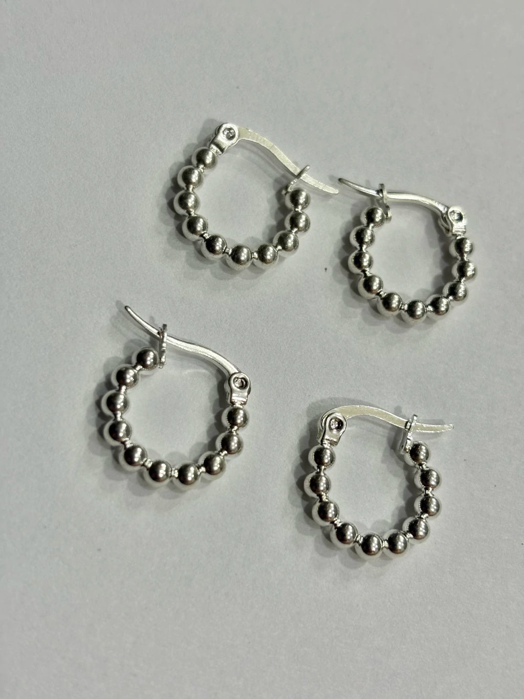 -555C argollas acero blanco x12