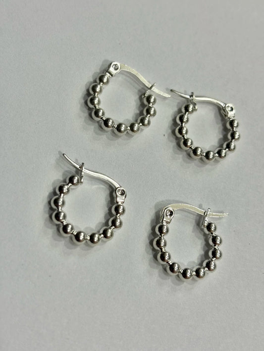 -555C argollas acero blanco x12