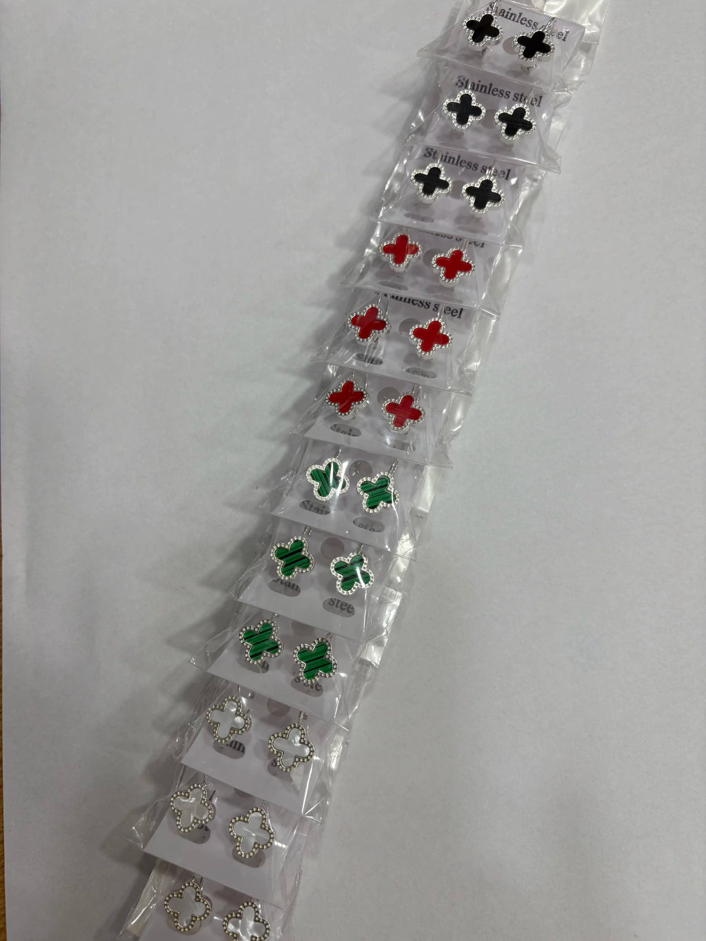 Aritos de trébol de acero blanco x12