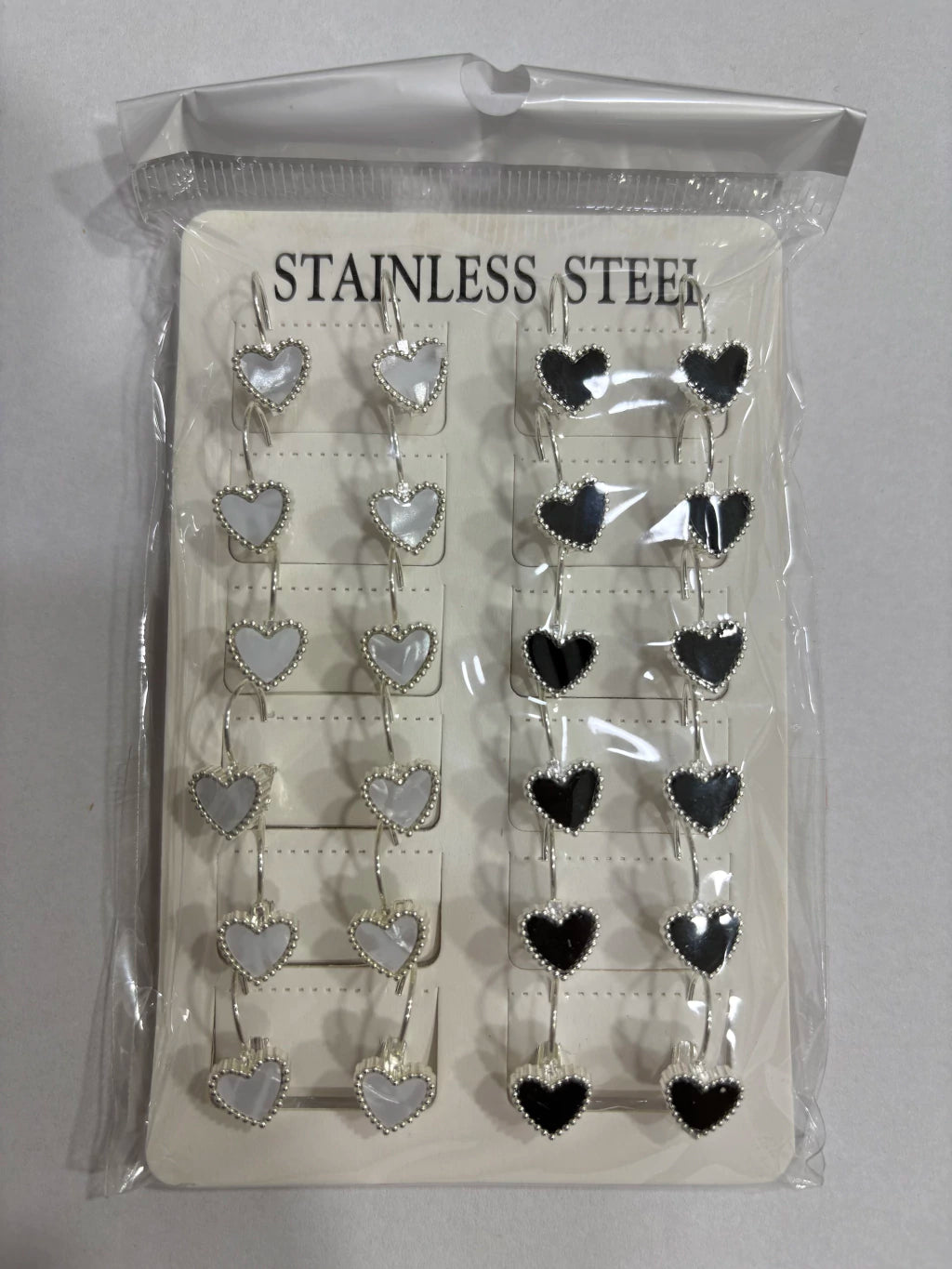 Aritos de acero blanco x12 (6)