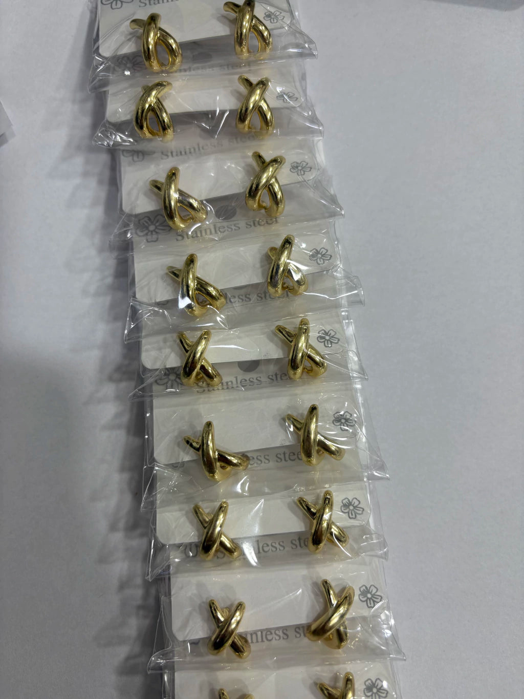 Aritos de acero dorado x12 656-B