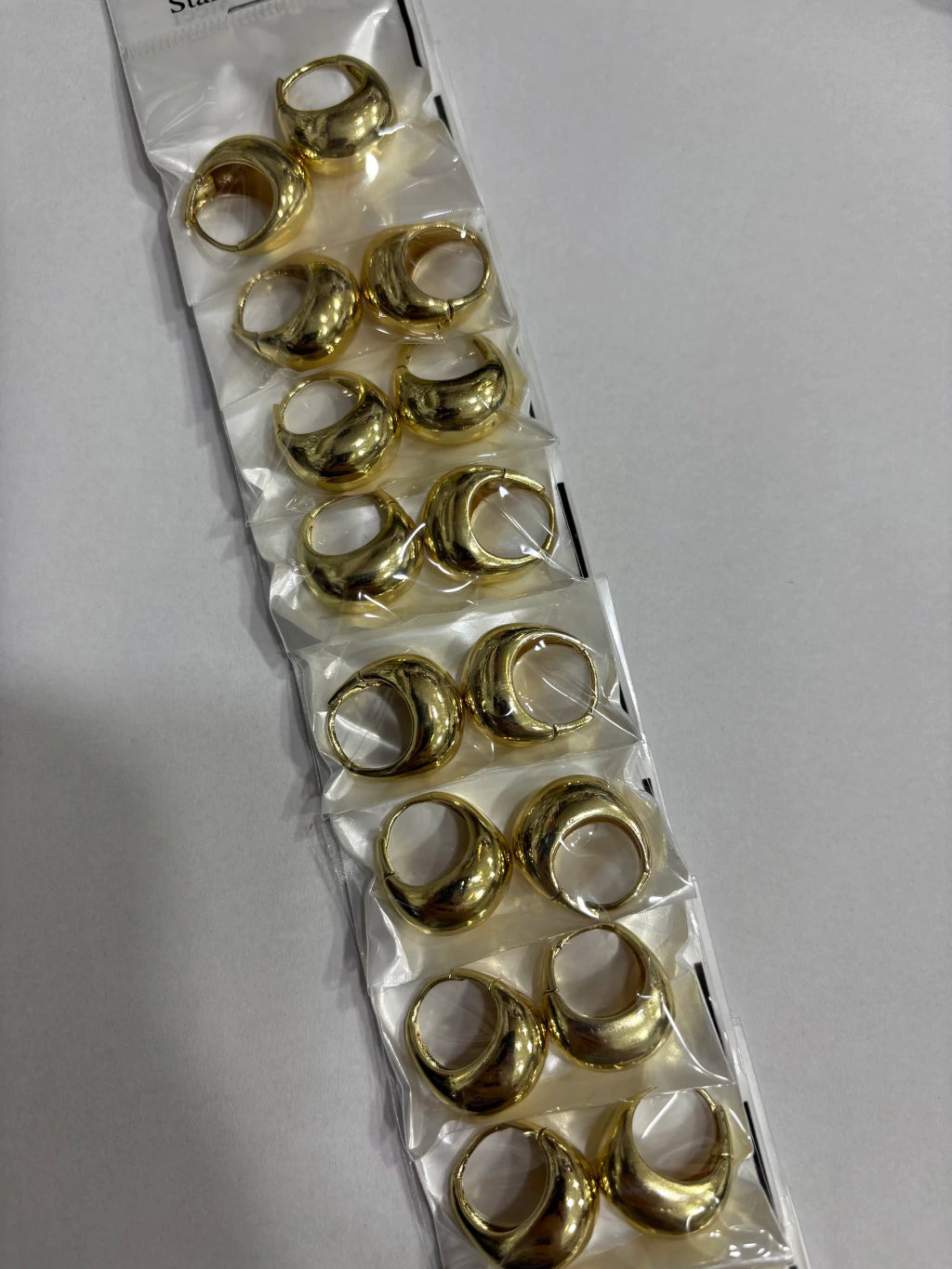 Aritos de acero dorado x12 654-B