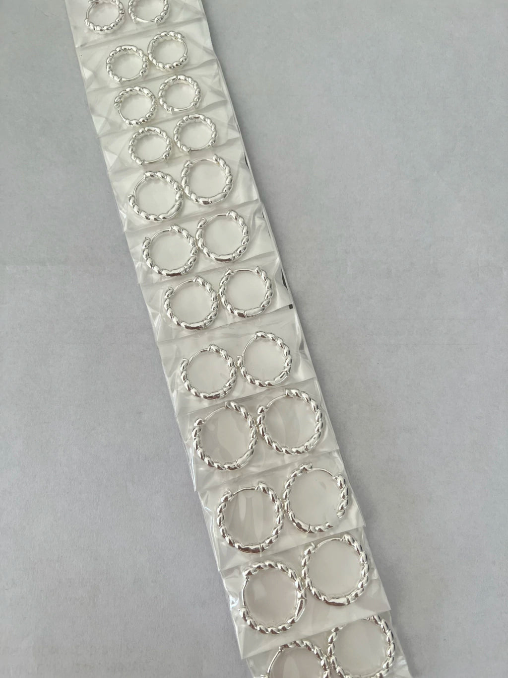 Aritos de acero blanco x12 663-C