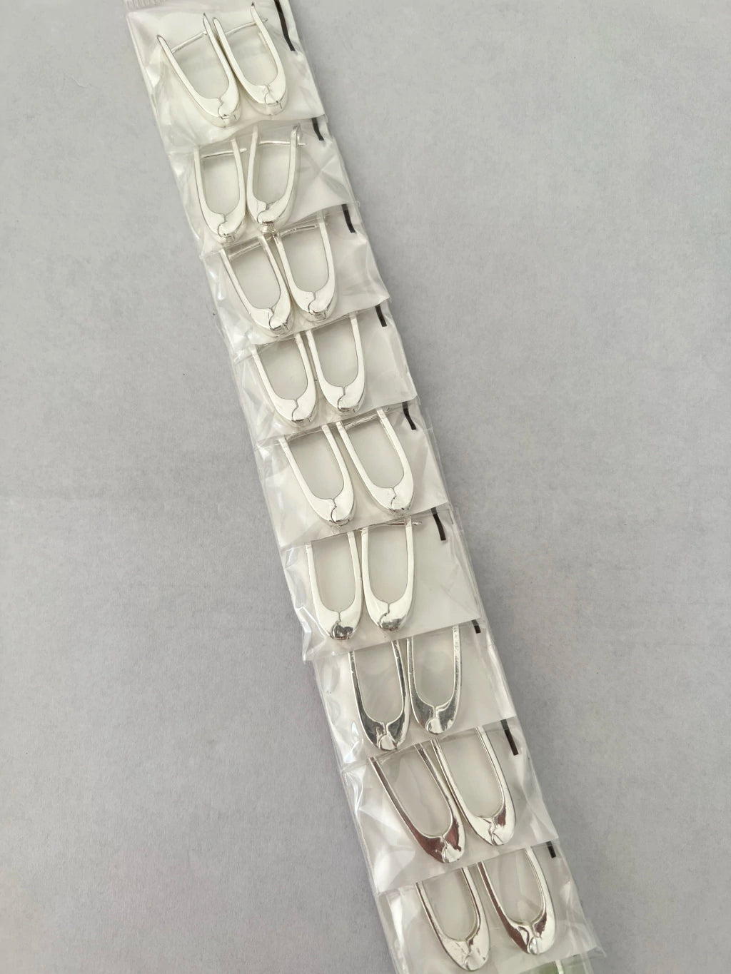 Aritos de acero blanco x12 651-C