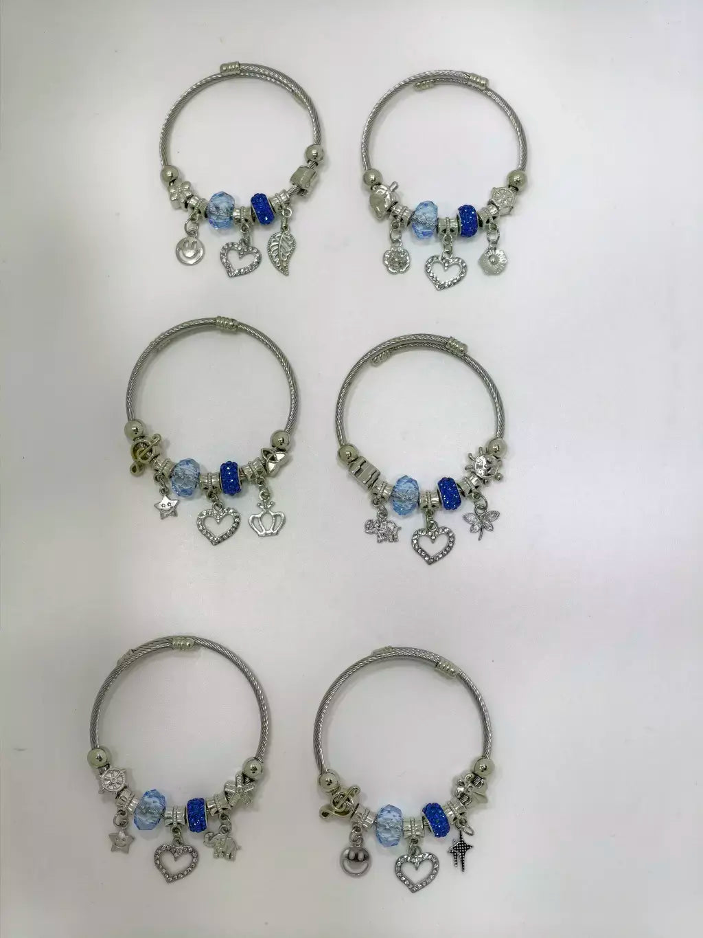 Pulseras con charms azul al azar en acero