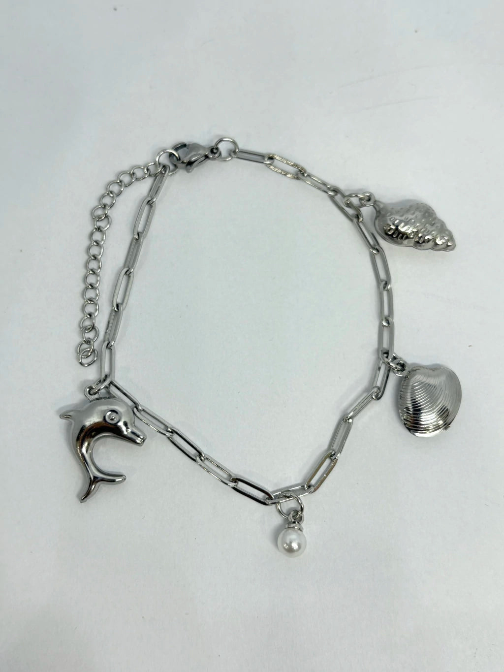 Pulsera de acero con dijes de estilo marino(entrega al azar)