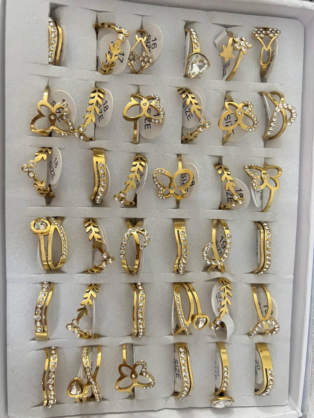728B anillos de acero dorado con strass