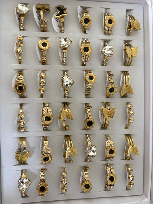 719B anillos de acero dorado con strass