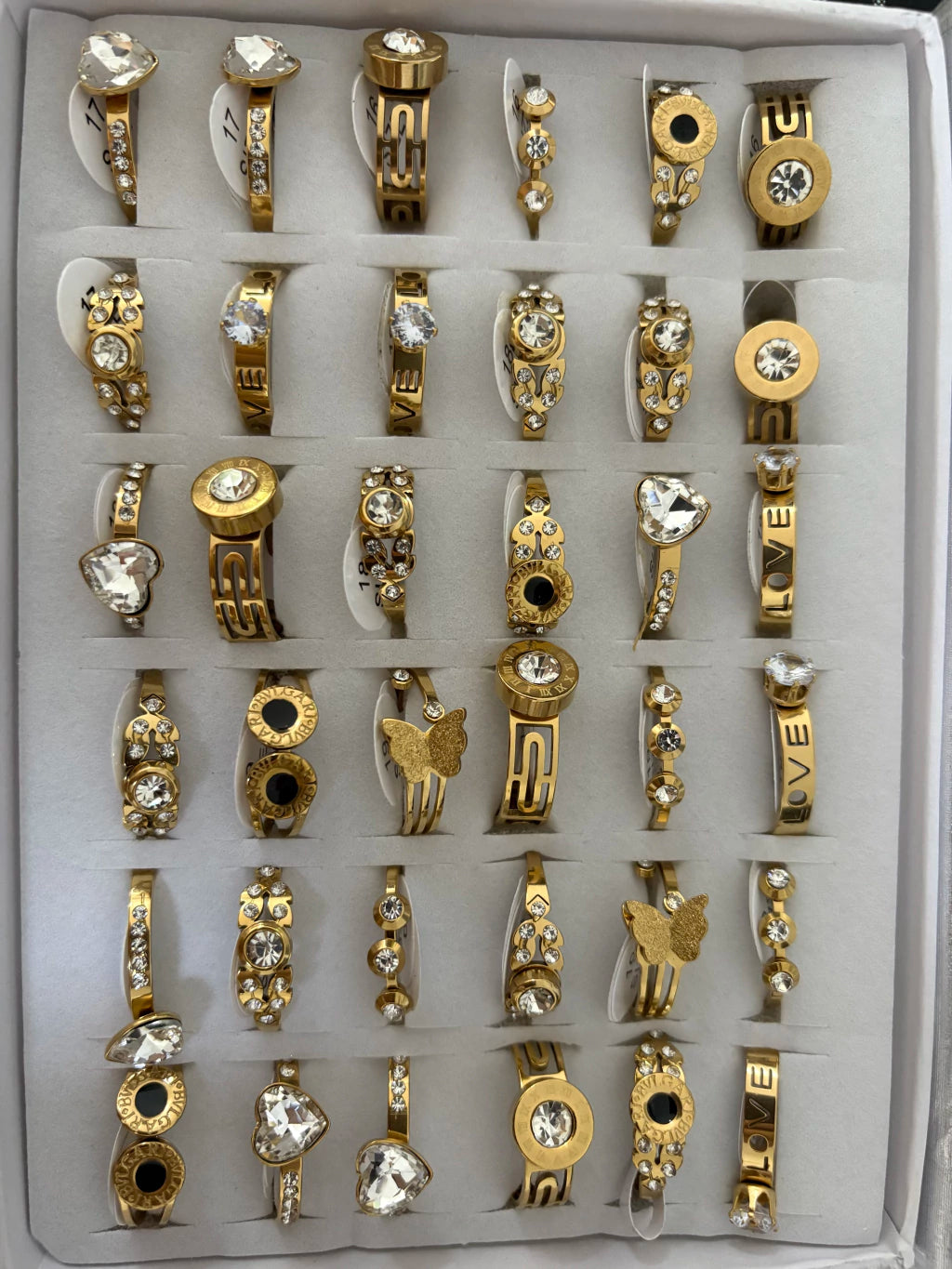 712B anillos de acero dorado con strass