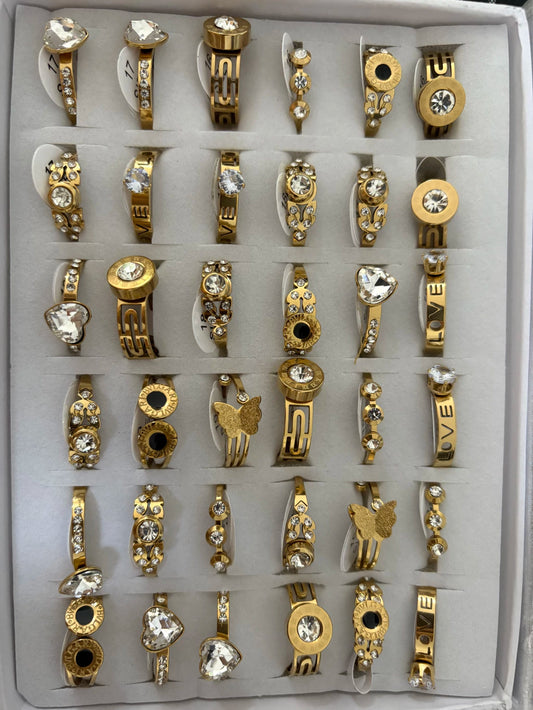 712B anillos de acero dorado con strass
