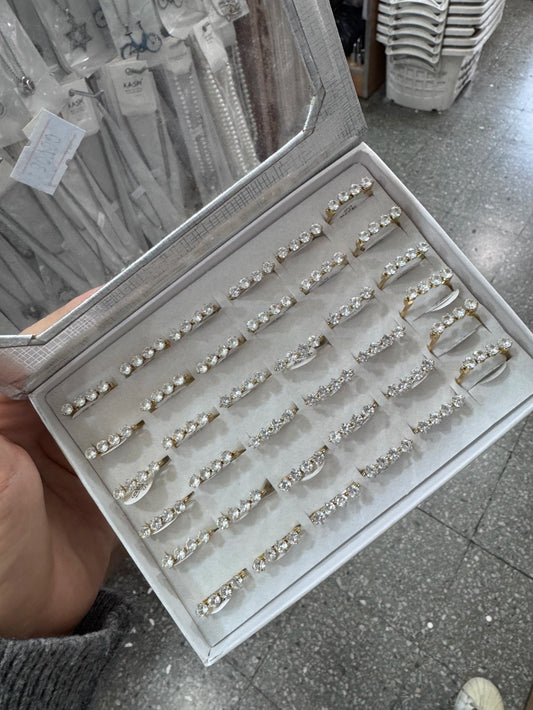 -82 Anillos por caja acero dorado
