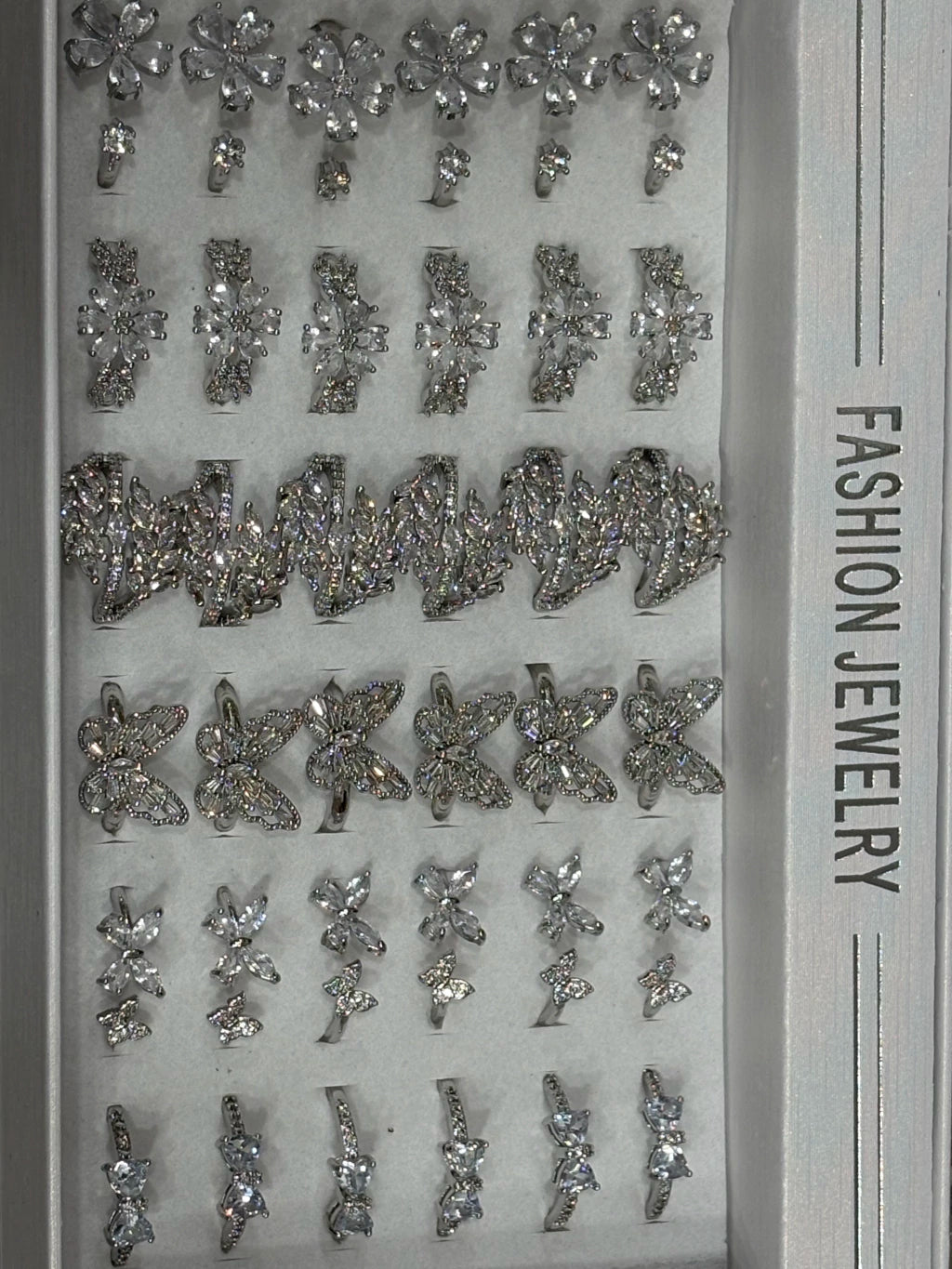 30015-A Anillos de acero plateado con strass