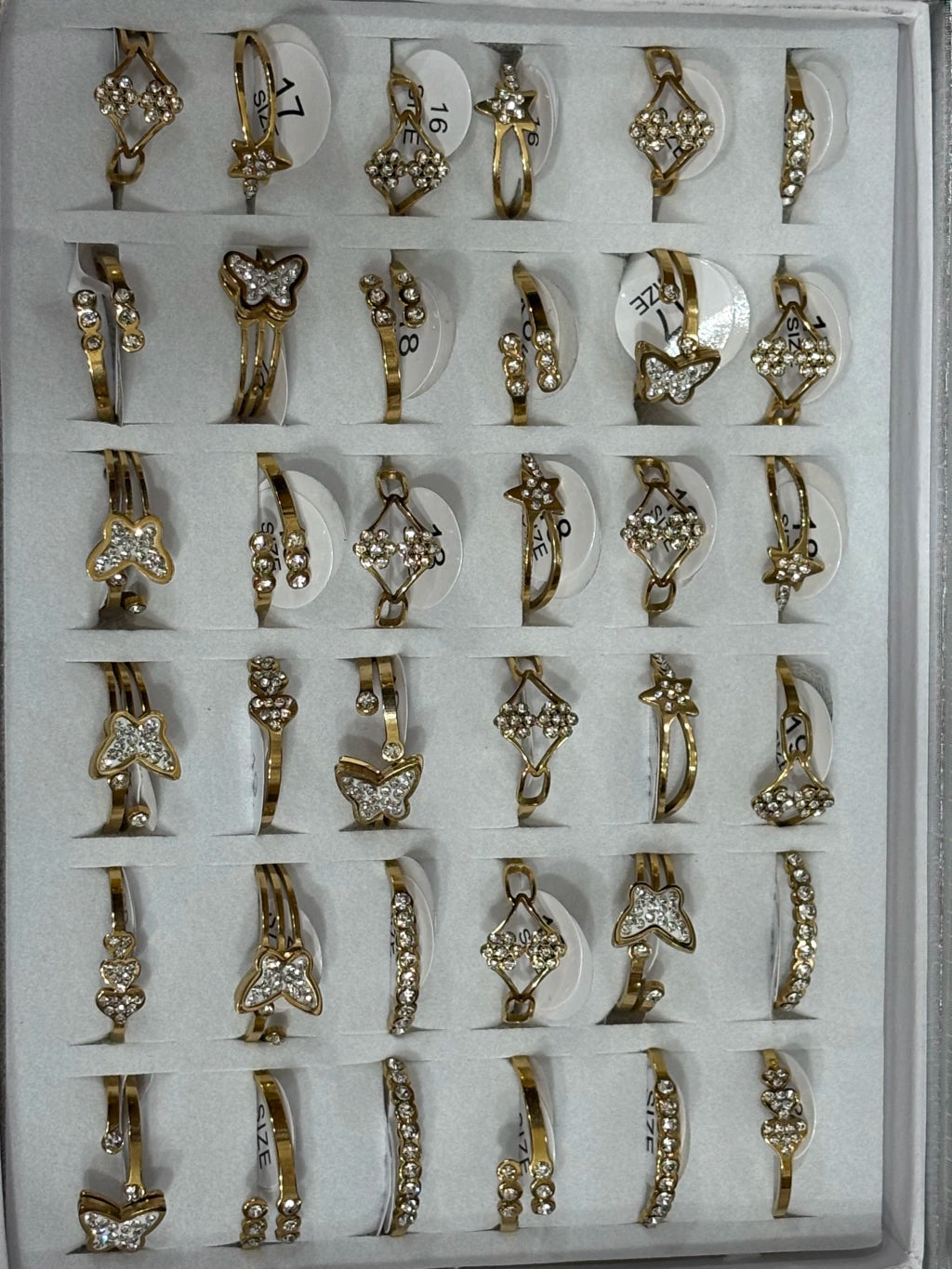 868-B Anillos de acero dorado con strass