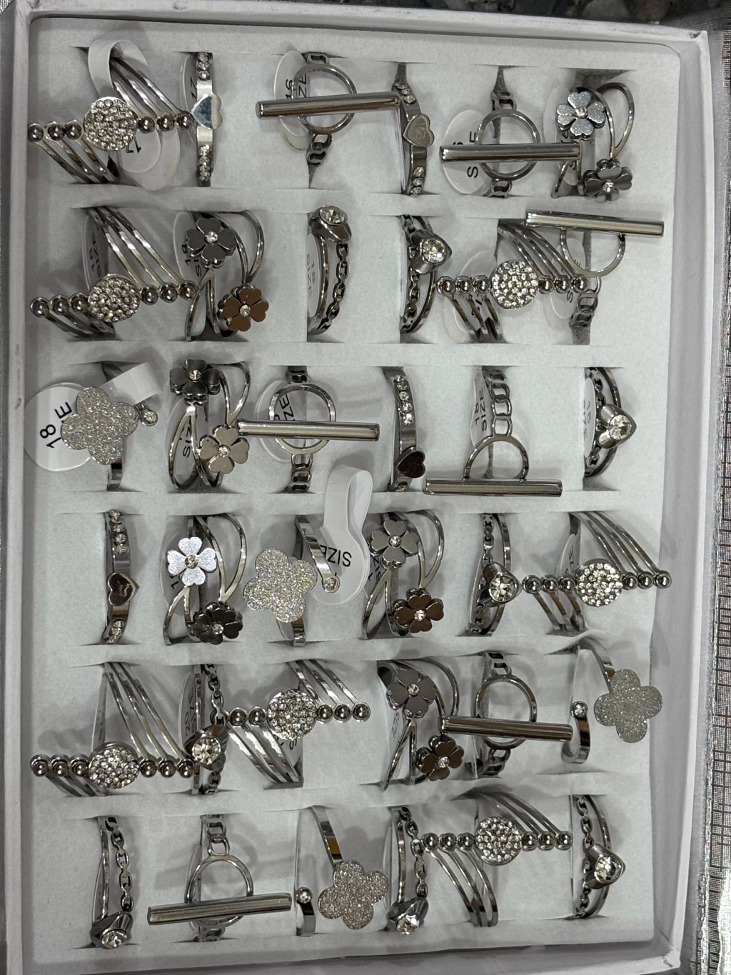 721-A Anillos de acero plateado con strass