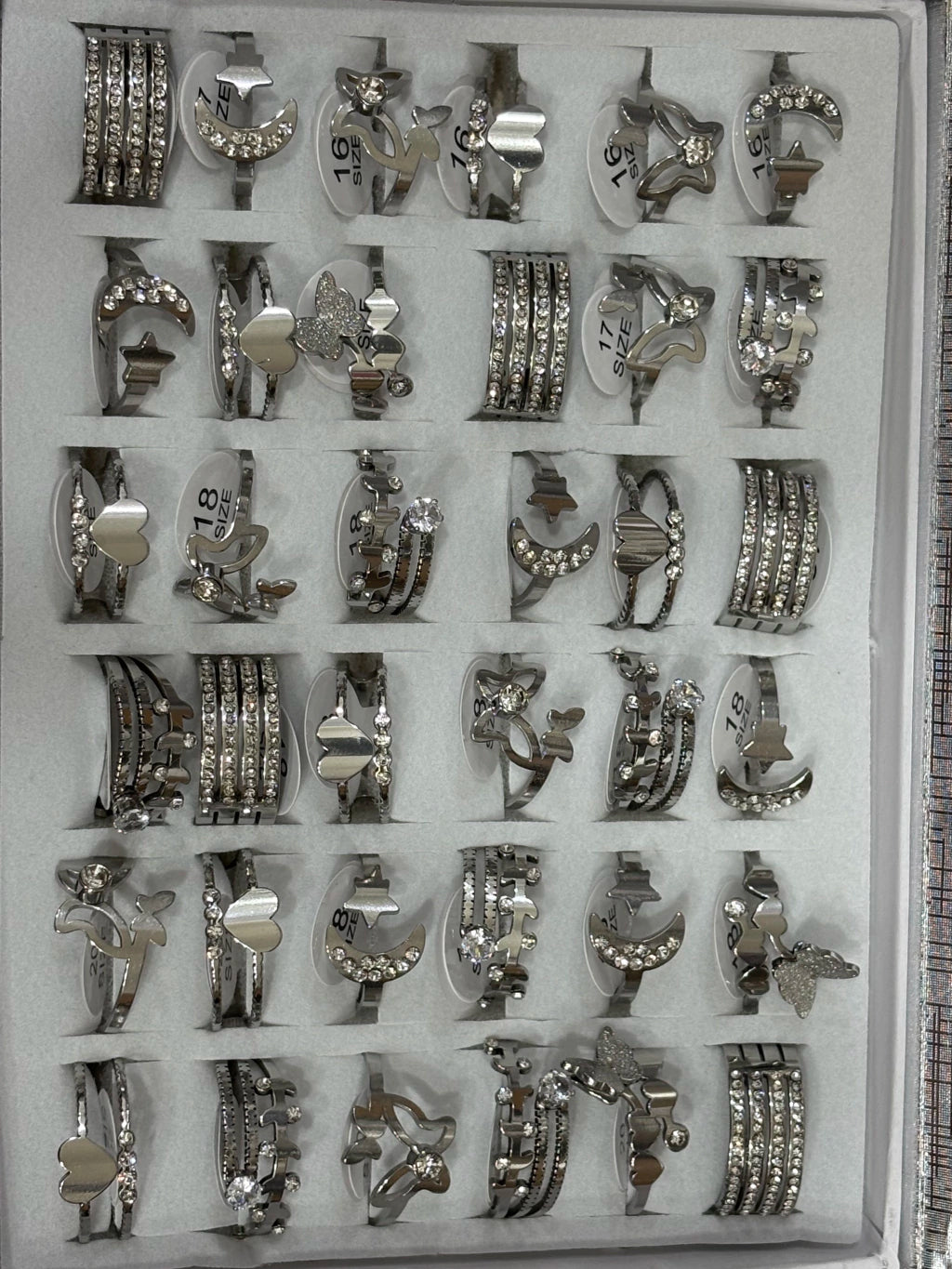 722-A Anillos de acero plateado con strass