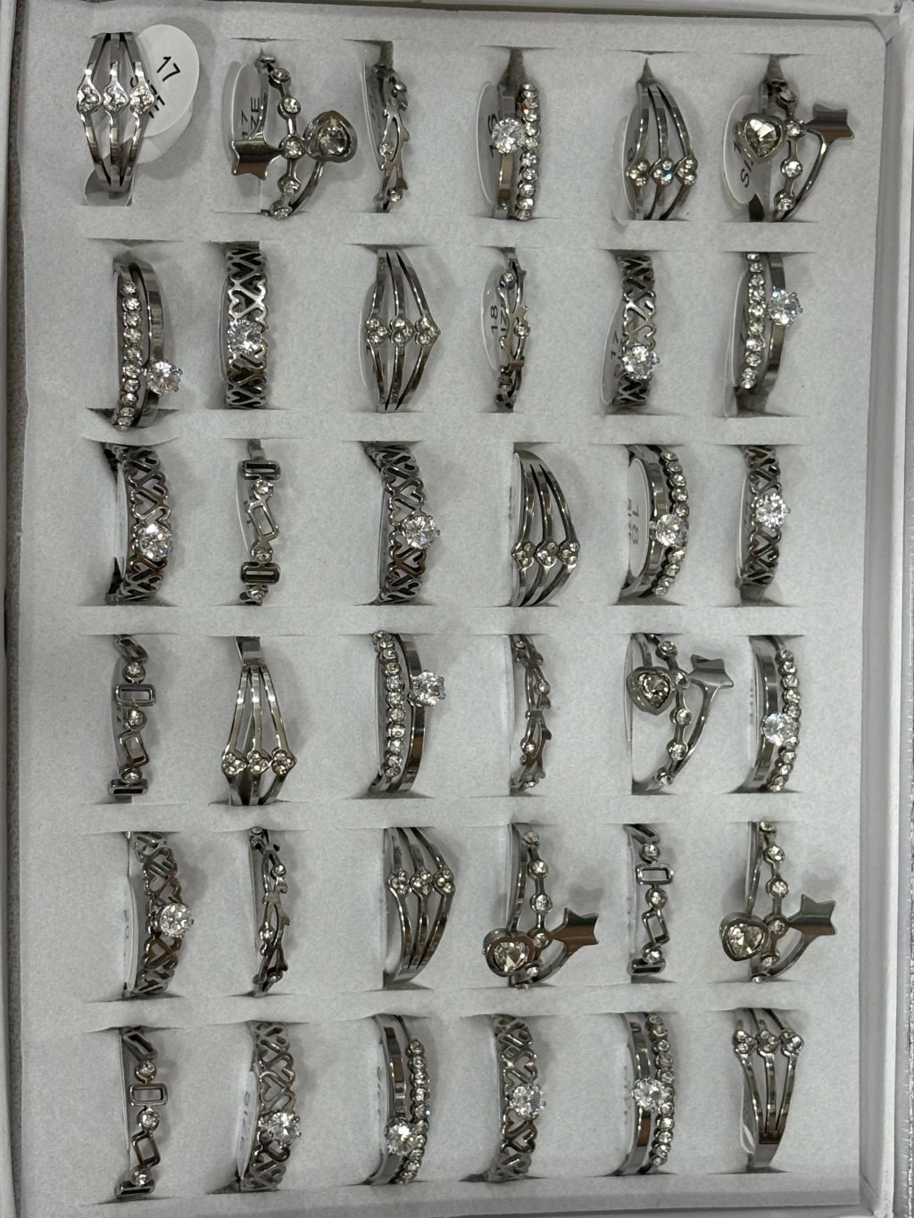 863-A Anillos de acero plateado con strass