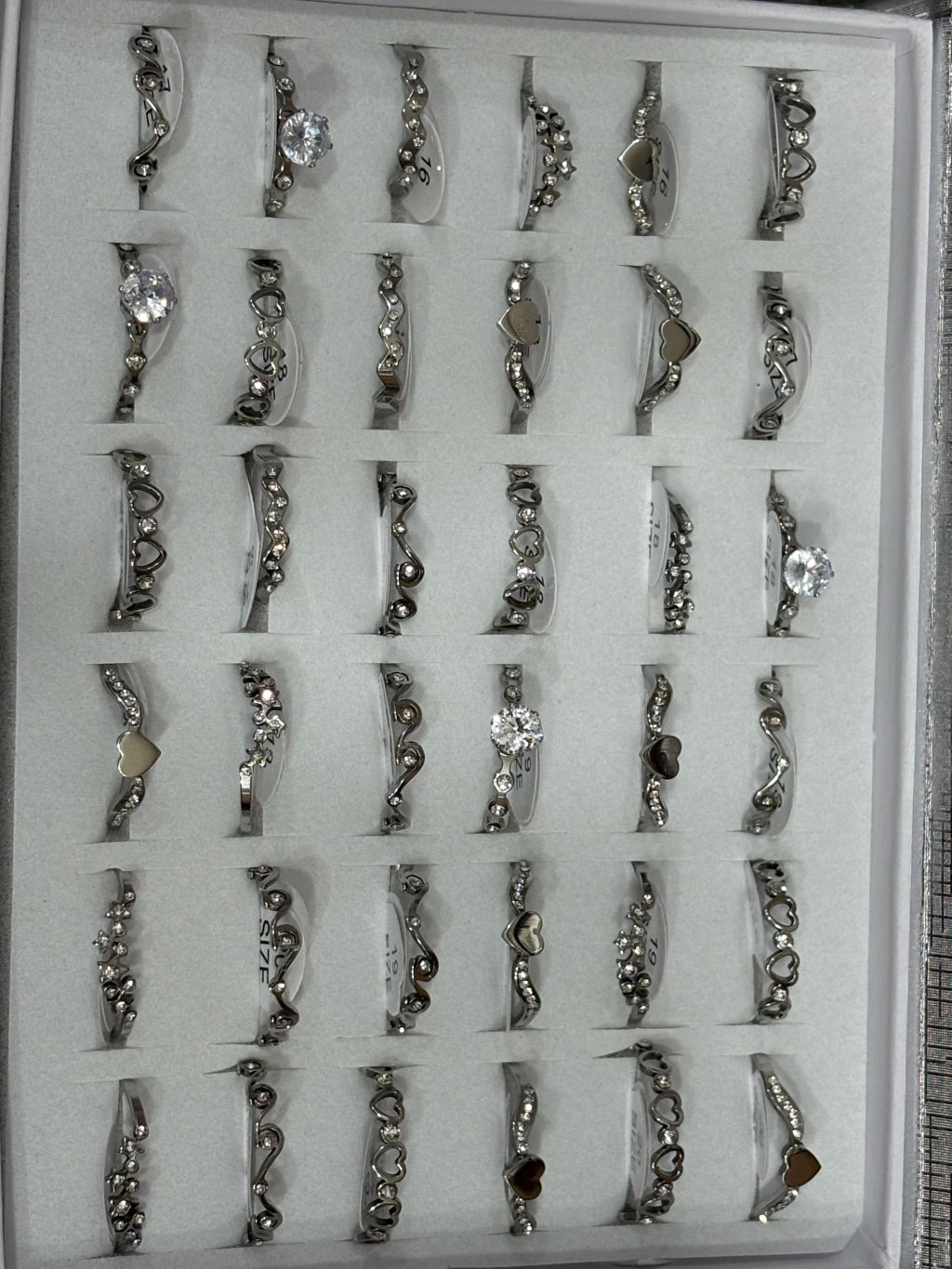 861-A Anillos de acero plateado con strass