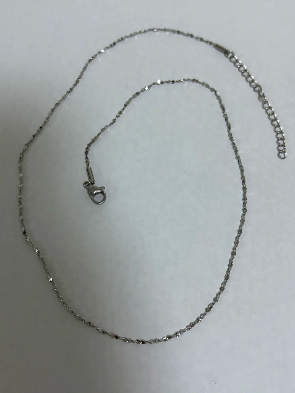 Collar de acero plateado