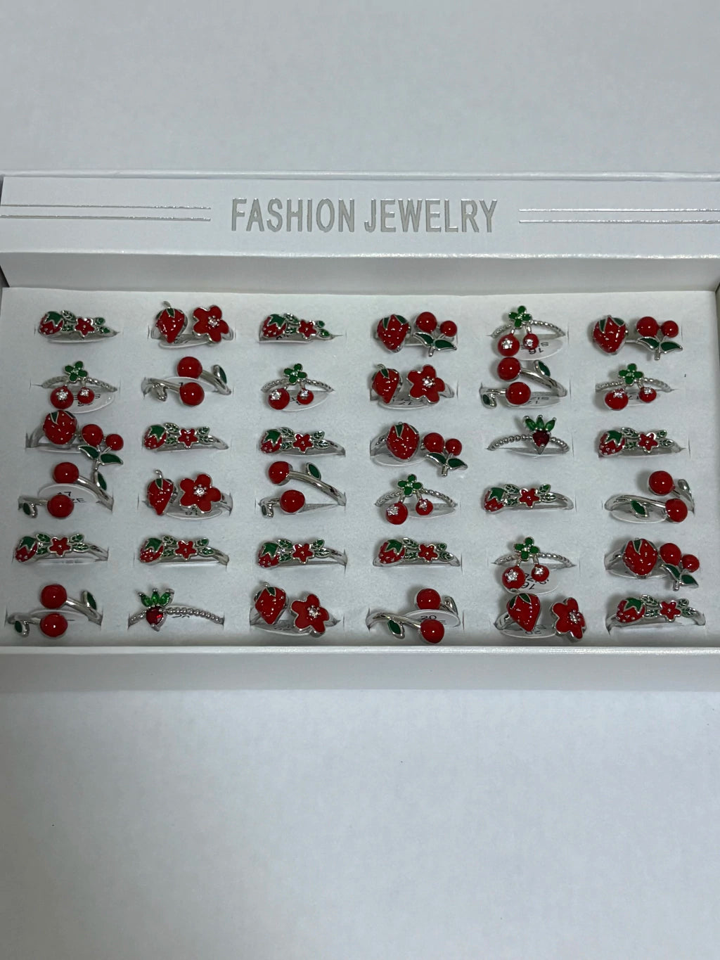 300010A Anillos ajustables de cereza y frutilla