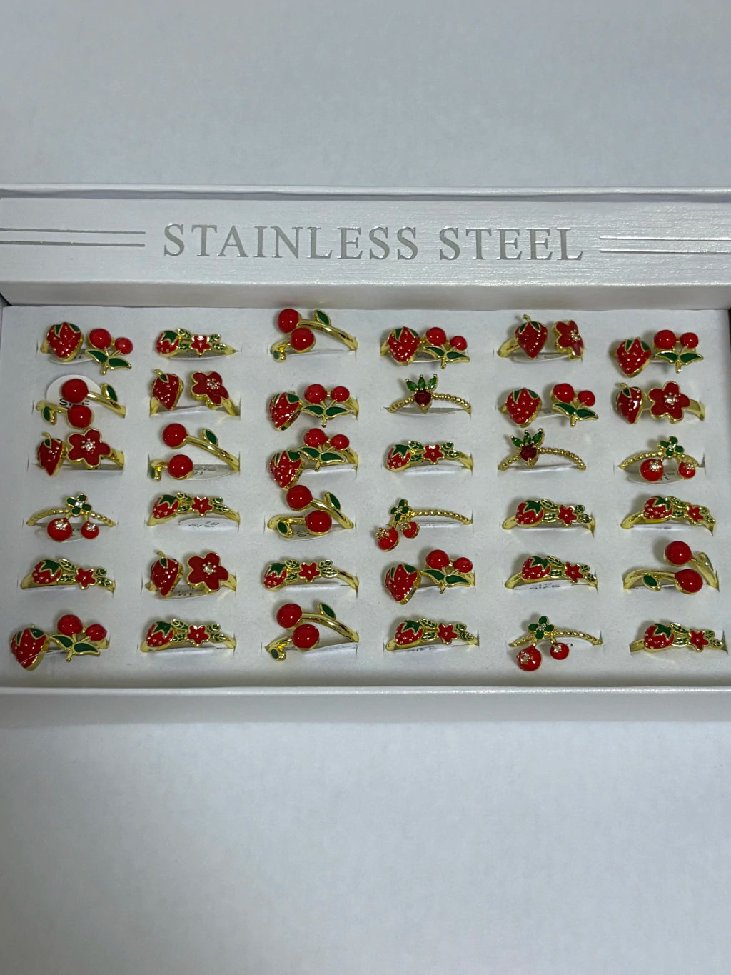 300010B Anillos ajustables de cereza y frutilla