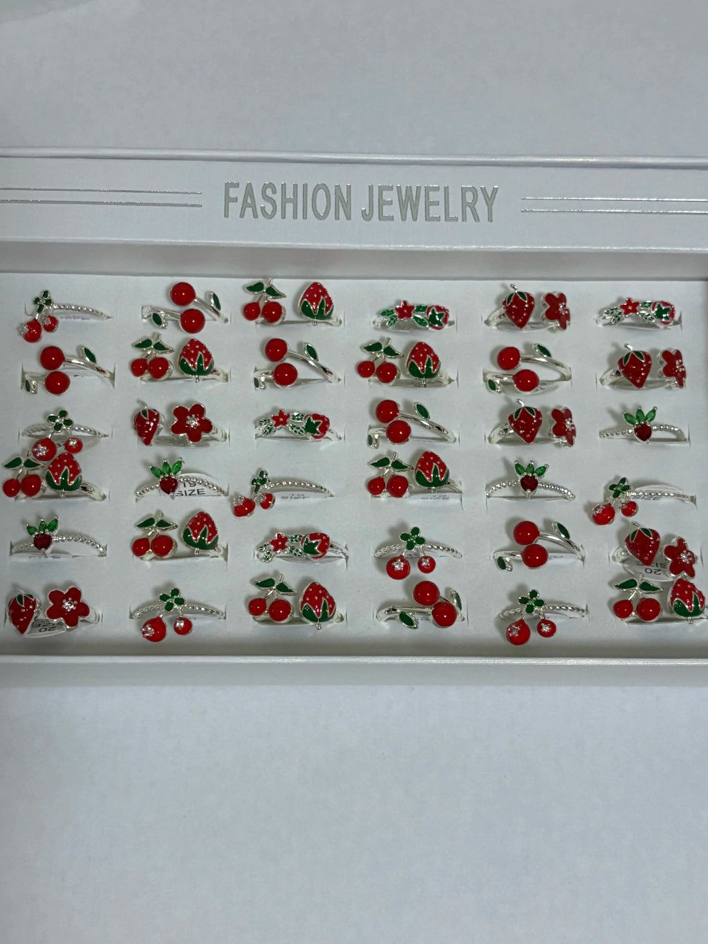 300010C Anillos ajustables de cereza y frutilla