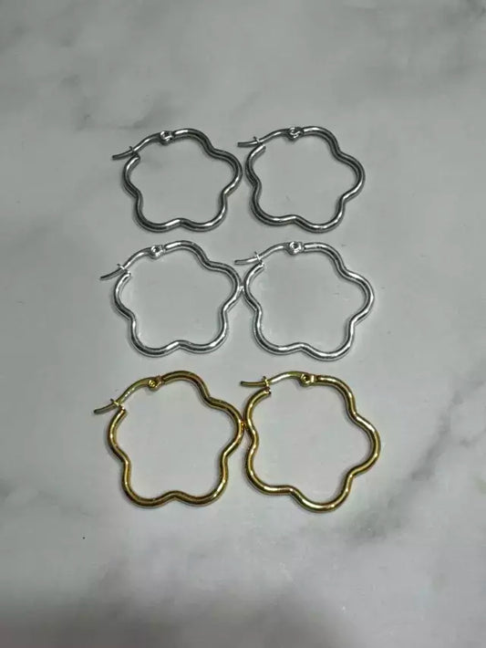 Aros acero dorado forma flor X docena