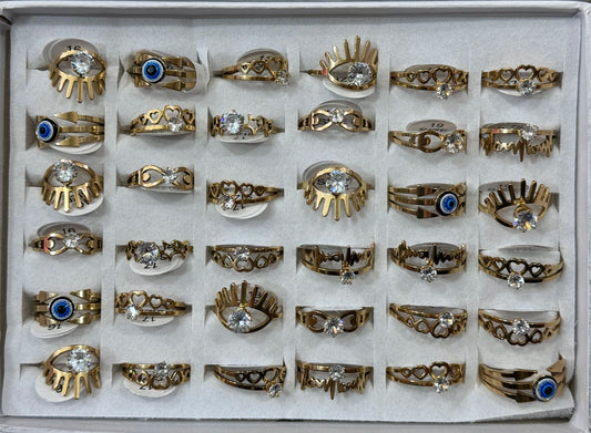 -26 Anillos por caja acero dorado