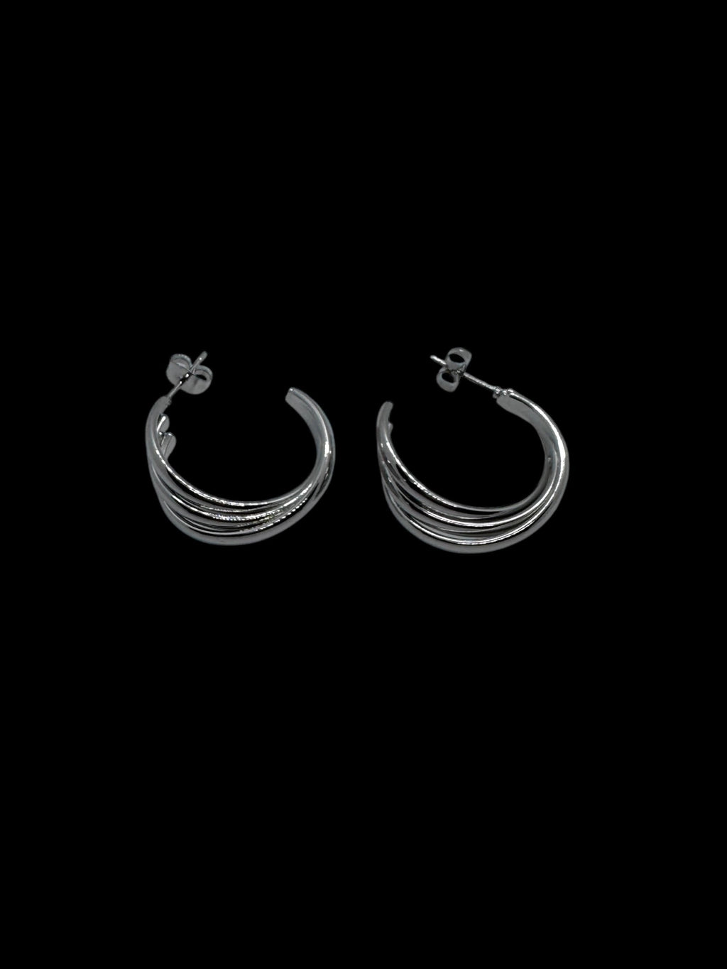 302-1 aros triples acero plateado docena