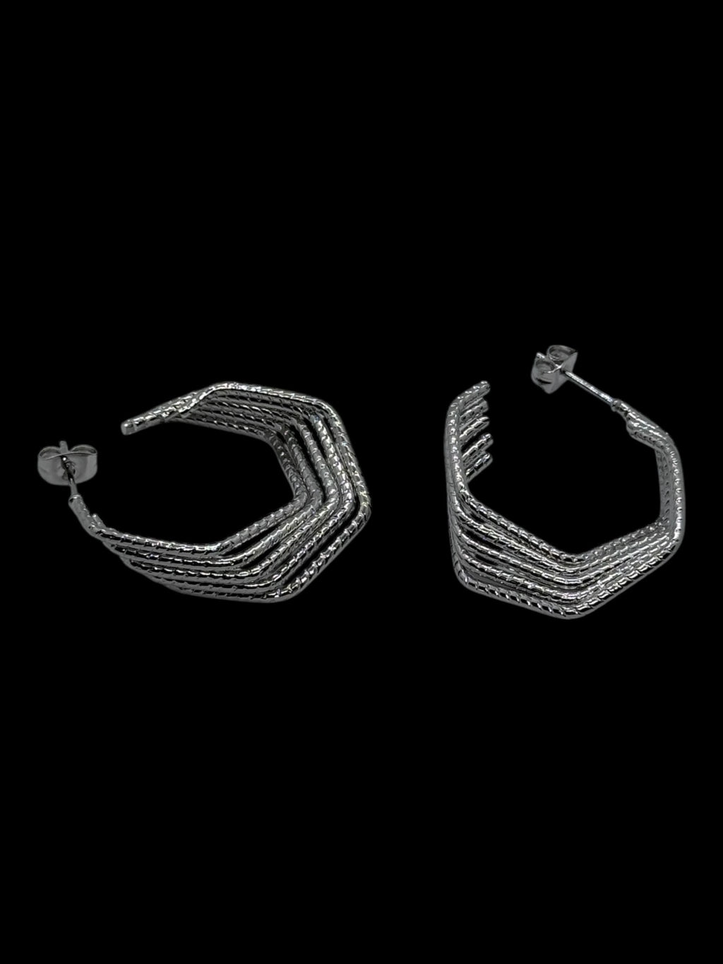 304-1 aros triples acero plateado docena