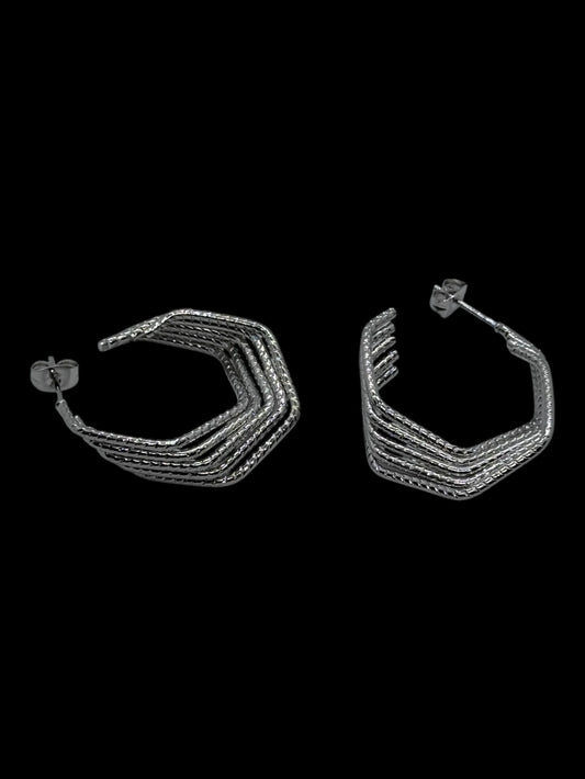 304-1 aros triples acero plateado docena