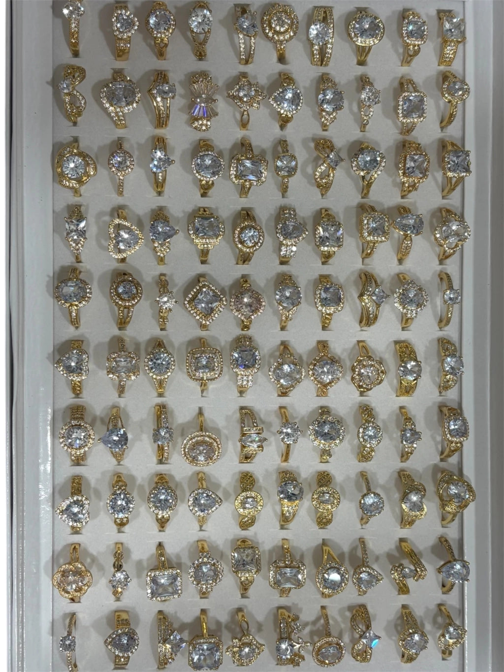 Anillos dorado con strass x100