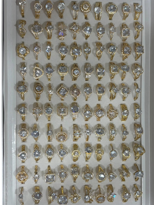 Anillos dorado con strass x100